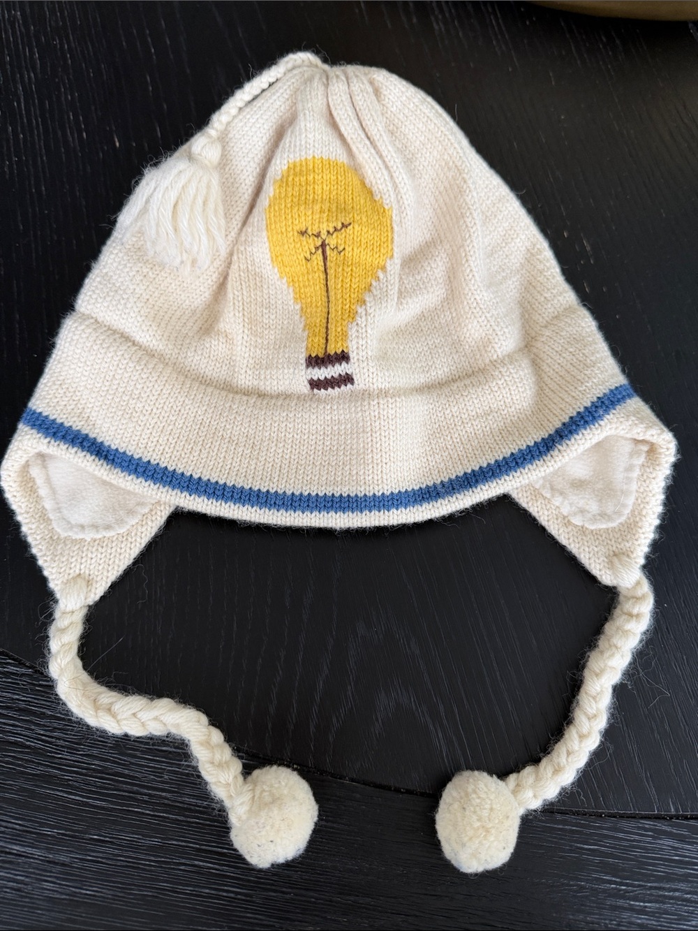 kate spade Cream Knit Earflap Hat with Yellow Lightbulb and Blue Trim